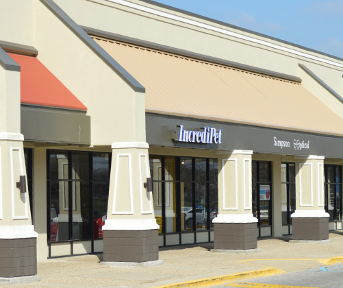 image of a storefront implementing a metal roofing system