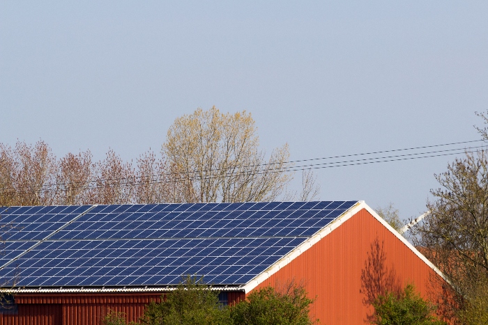 A pole barn with solar panels can provide for it's own electrical needs.